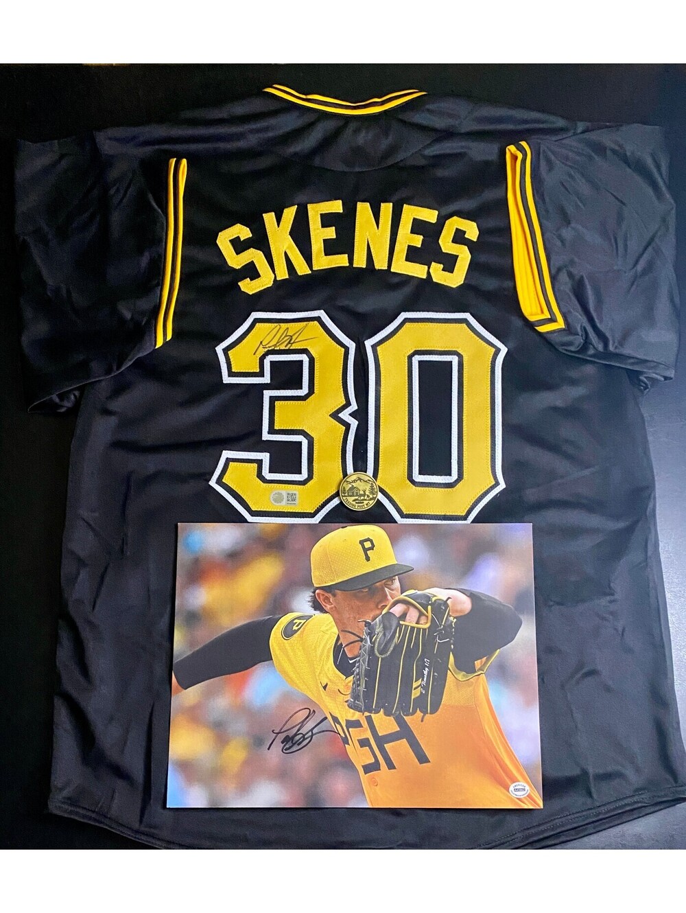 Two Signed Paul Skenes Items - Jersey and Photo